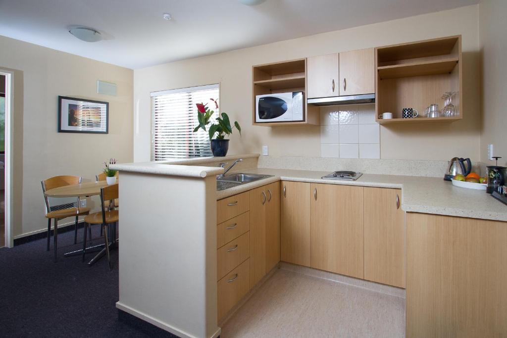 Alhambra Oaks Motor Lodge Dunedin Rum bild